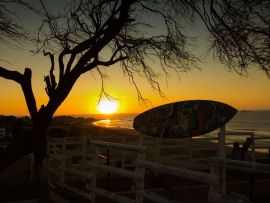 Lais Puzzle - Sonnenuntergang und Surfbrett in Lobitos, Peru - 500 & 1.000 Teile