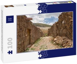 Lais Puzzle - Die Steinhäuser entlang der kopfsteingepflasterten Straßen sind größtenteils verlassen und verfallen in Real de Catorce, Mexiko - 100 Teile