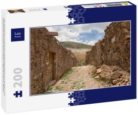 Lais Puzzle - Die Steinhäuser entlang der kopfsteingepflasterten Straßen sind größtenteils verlassen und verfallen in Real de Catorce, Mexiko - 200 Teile