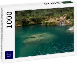 Lais Puzzle - Türkisfarbenes Wasserbecken mit Kalksteinformationen unter Wasser, umgeben von Wasserfällen im mit Farnen bewachsenen Fels, Mexiko - 1.000 Teile