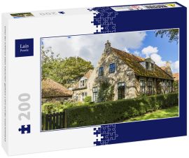 Lais Puzzle - Eines der schönen alten Häuschen (gebaut 1797) auf der Insel Ameland - 200 Teile