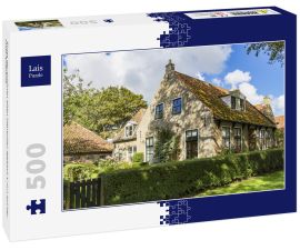 Lais Puzzle - Eines der schönen alten Häuschen (gebaut 1797) auf der Insel Ameland - 500 Teile