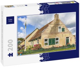 Lais Puzzle - Eine der schönen alten Hütten (erbaut 1516) auf der Insel Ameland - 200 Teile