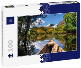 Lais Puzzle - Segeln in einem Holzboot durch den überfluteten Wald in Leticia, Amazonasgebiet, Kolumbien - 100 Teile