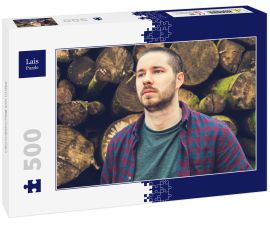 Lais Puzzle - Mann mit Baumstämmen - 500 Teile