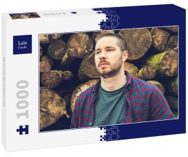 Lais Puzzle - Mann mit Baumstämmen - 1.000 Teile