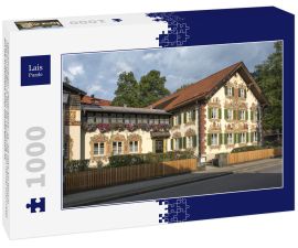 Lais Puzzle - Oberammergau, Deutschland - 21. Juli 2019; Ein Haus in Oberammergau, in dem die Geschichte von Hänsel und Gretel auf die Außenseite eines Hauses gemalt ist - 1.000 Teile