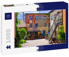 Lais Puzzle - Farbenfrohes Leben, Innenhof Neuruppin - 1.000 Teile
