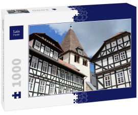 Lais Puzzle - Turm der Stiftskirche mit Fachwerkhäusern in Kaufungen / Hessen - 1.000 Teile