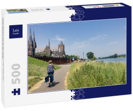 Lais Puzzle - Frau radelt entlang der Maas in der Nähe des niederländischen Dorfes Cuijk - 500 Teile