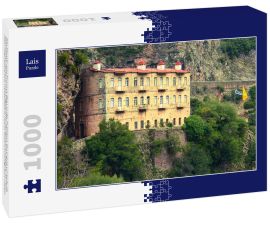Lais Puzzle - Das Kloster von Prousos liegt in der Präfektur Evrytania und gilt als spirituelles Zentrum und Pilgerstätte der gesamten Region. Es ist in einer majestätischen Landschaft in einem steilen Felsengebiet erbaut. - 1.000 Teile