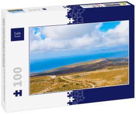Lais Puzzle - Kleine orthodoxe Kapelle im Hochland der griechischen Kykladeninsel Andros mit der Insel Euböa im Hintergund - 100 Teile
