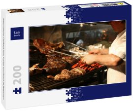 Lais Puzzle - Argentinischer Chefkoch beim Kochen von Fleisch im Restaurant - 200 Teile