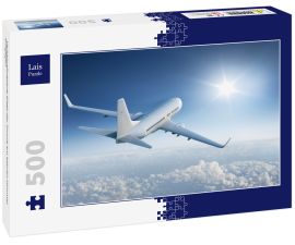 Lais Puzzle - Verkehrsflugzeug fliegt der Sonne am blauen Himmel entgegen - 500 Teile