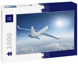 Lais Puzzle - Verkehrsflugzeug fliegt der Sonne am blauen Himmel entgegen - 1.000 Teile