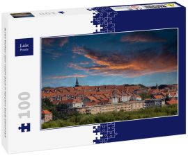 Lais Puzzle - Bunte Wolken über rotem Dach in Randers Stadt Dänemark - 100 Teile