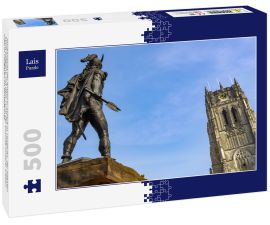 Lais Puzzle - Rückansicht der Ambiorix-Statue in Tongeren, der ältesten Stadt Belgiens, mit dem Turm der Basilika Unserer Lieben Frau in Tongeren im Hintergrund - 500 Teile
